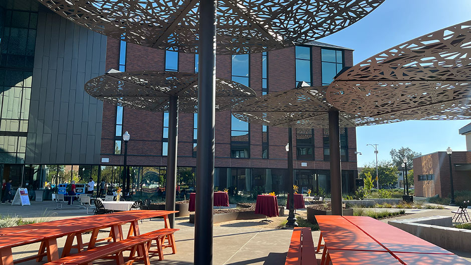 Photo of shaded outdoor seating at SCC Natural Sciences Building lobby